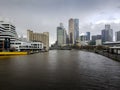 View of the famous Yarra River, with commercial buildings on both sides of the banks