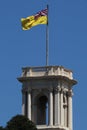 The flag of the Governor of Victoria raised over the belvedere tower of Government House, Melbourne.