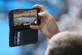 Unidentified spectator uses his cell phone to take images during tennis match at 2019 Australian Open in Melbourne Park Royalty Free Stock Photo