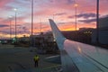 MELBOURNE, AUSTRALIA - JULY 30, 2018: Ground staff is standing by near a plane ready to take off at Melbourne Airport in the