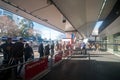 MELBOURNE, AUSTRALIA - JULY 26, 2018: Long queue of tourists passengers waiting for Sky bus at Melbourne airport Terminal 2 in the