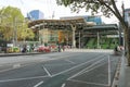 Pedestrians and traffic near the steps and entrance to Southern Cross railway station in Melbourne