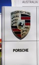 Porsche automobile dealership sign.