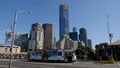 Melbourne, Australia - March 29, 2018: Tram going on the Princess bridge with skyscrapers of Melbourne downtown in the background