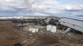 Airplane lowering altitude to below cloud level