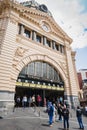 Melbourne, Australia - Nov 10, 2018 : People waliking around Flinders Street railway station is landmark in the downtown of