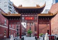 Chinese brown monumental gate as entrance to Chinatown, Melbourne, Australia