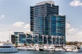 Yachts in front of highrise architecture at Docklands in Melbourne, Australia
