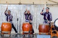 Japanese drummers performing at street festival.