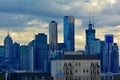 Melbourne city skyline over a moody cloudy sunrise sky