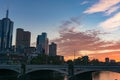 Melbourne downtown cityscape with colorful sunrise sky on the ba