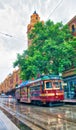 MELBOURNE - NOVEMBER 2015: City tram along the streets on a rain