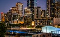 Melbourne skyline at dusk with riverside quay buildings at night in Melbourne Australia