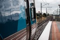 A Melbourne train waiting at signal on a platform Royalty Free Stock Photo