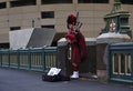 Man wearing Scottish kilt blowing bagpipes Royalty Free Stock Photo