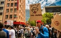 Melbourne, Victoria Australia - November 20 2021: Man in blue shirt red cap holds up a Jail Daniel Andrews sign on Bourke Street