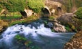 Melide, Spain - The Medieval Bridge Puente San Xoan across the River Furelos, outside Melide in Galicia, on the Camino de Santiago