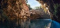 Melissani cave or Melissani lake near Sami town on Kefalonia island, Greece. Colorful artistic panorama photo. Tourism concept