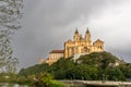 The historic Melk Abbey and church spires on the rocky promontory above the Danube River