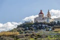 Mellieha village or small town with parish church on the top of the hill in Malta Royalty Free Stock Photo