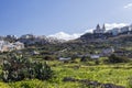 Mellieha village or small town with parish church on the top of the hill in Malta Royalty Free Stock Photo