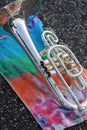 Mellophone on tie-dye towel Royalty Free Stock Photo