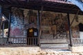 Fresco on church wall in courtyard of The Medieval Orthodox Monastery of Rozhen, near Melnik, Bulgaria Royalty Free Stock Photo