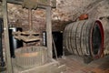 MELNIK, CZECH REPUBLIC. A press for a juice extraction from grapes and a flank for aging of wine. Wine vault of the museum o