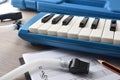 Melodica in case elements for the study elevated view Royalty Free Stock Photo