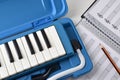 Melodica in case elements for the study of music Royalty Free Stock Photo