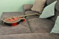 Melodija Menges old ruined vintage archtop jazz guitar 1961. Guitar on the sofa