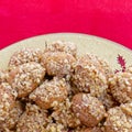 `melomacarona` traditional Greek Christmas cookies on a red background
