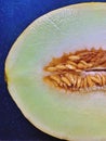 melon cut in half, yellow melon, juicy fruit, light yellow melon, cantaloupe melon Royalty Free Stock Photo