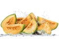 Melon falling in water Royalty Free Stock Photo