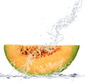 Melon falling in water Royalty Free Stock Photo