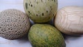 top view of several types of melons on a white wooden table Royalty Free Stock Photo