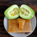 Melon fruits cut in half ready to eat with sugar bar