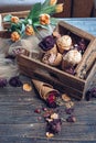 Melon ice cream with nut crumb in wooden boxes. Rustic composition