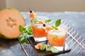 Melon juice, lemonade garnished with cucucmber slice, fresh summer drink Royalty Free Stock Photo