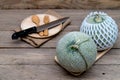 Melon and knife on cutting board Royalty Free Stock Photo