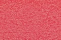Melon pink expanded polyethylene foam sample background.