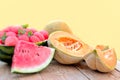 Melon and watermelon on the table, juicy and delicious refreshment on hot summer days Royalty Free Stock Photo