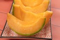 Melon wedges on a table Royalty Free Stock Photo