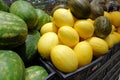 Melons in the market, a lot of melons. large yellow fruit Royalty Free Stock Photo