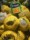 Melons in yellow plastic package Royalty Free Stock Photo