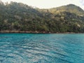 Melsisi village, Pentecost Island / Vanuatu - 9 JUL 2016 : shore of the tropical pacific ocean from above with lush rainforest Royalty Free Stock Photo