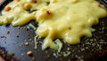 Melted cheese spread across a flat, dark surface generated Royalty Free Stock Photo