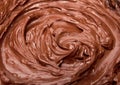 Melted chocolate. Chocolate swirl. Liquid chocolate as background Royalty Free Stock Photo