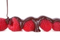 Melted Chocolate Pouring Over Raspberries Royalty Free Stock Photo