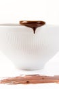 Melted dark chocolate dripping from the spoon Royalty Free Stock Photo